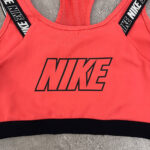 نیم تنه ورزشی استوک NIKE صورتی سایز L