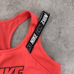 نیم تنه ورزشی استوک NIKE صورتی سایز L